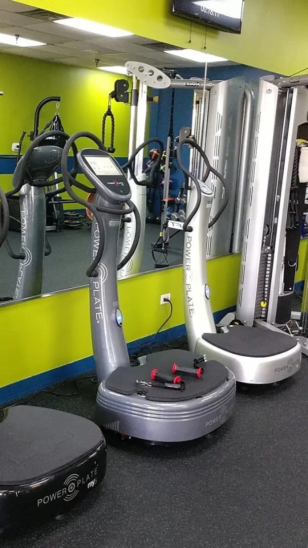 Close-up of silver and black Power Plate machines inside a fitness facility in Inverness.